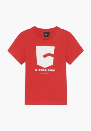 Camiseta de algodón roja con un gran logo gráfico blanco y el texto "G-STAR RAW" impreso en el centro, cuello redondo y mangas cortas.