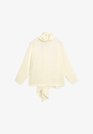 Kremowy top z długim rękawem, z dekoltem w kształcie ciała, o asymetrycznym dołku i miękkiej fakturze. Minimalistyczny design bez dodatkowych wzorów czy akcentów.