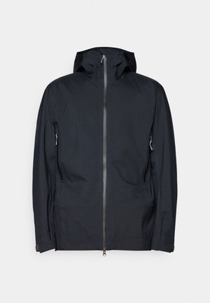 Črna kapuca jakna iz gladkega, vodoodpornega materiala. Ima polni zadrgo na sprednji strani, dva stranska žepa in nastavljive manžete.