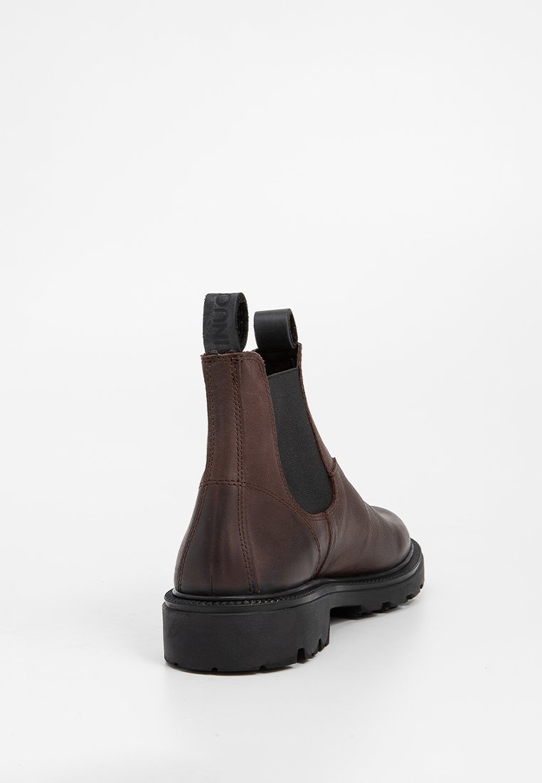 Braune Leder-Chelsea-Stiefel mit elastischen Seitenpaneelen, Zuglaschen und einer robusten schwarzen Gummisohle mit strukturiertem Finish.