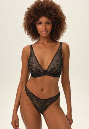 Black lace lingerie set featuring a triangular bralette and matching thong. Intricate floral patterns, scalloped edges, and soft texture.
