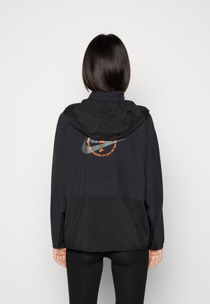 Nike Sportswear Windjack - black/black/safety orange