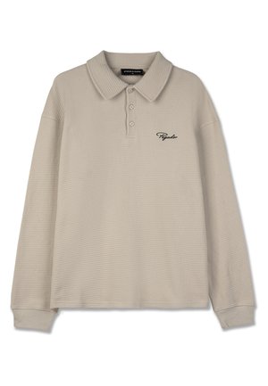 Beige polo tričko s dlouhým rukávem vyrobené z texturovaného vaflového úpletu, s klasickým límečkem, třemi knoflíky a černým logem jako akcentem.