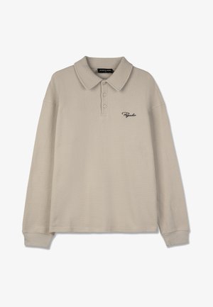 Beige polo tričko s dlouhým rukávem vyrobené z texturovaného vaflového úpletu, s klasickým límečkem, třemi knoflíky a černým logem jako akcentem.