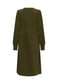 Olijfgroen corduroy jurk met lange mouwen, ronde halslijn en een losse pasvorm. Beschikt over een ontwerp met een achterpaneel en ribbelmanchetten.
