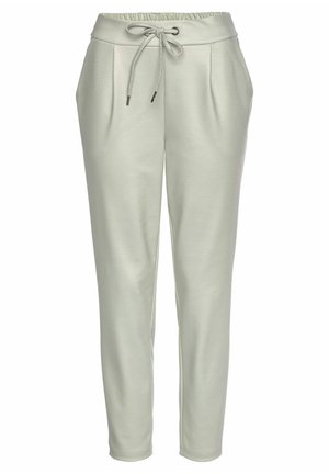 Lichtgrijze sweatpants met een elastische tailleband, trekkoordsluiting, zijzakken en een taps toelopend ontwerp. Soepele, zachte stoftextuur.