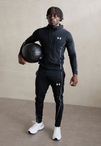 Under Armour - TRACKSUIT - Tuta - black/white Immagine in miniatura 1