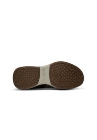 Shoe sole with textured brown rubber, featuring a patterned grip surface and a contrasting light beige midsole. Brand logo visible.