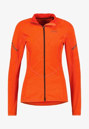 Veste orange vif à manches longues avec fermeture éclair noire à l'avant, col montant, bandes réfléchissantes minimales sur les manches, et logo "GORE" sur la poitrine.