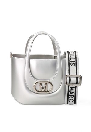 Silver handbag with dual handles, front flap featuring a metal "M" emblem, and an adjustable black-and-white strap with text.