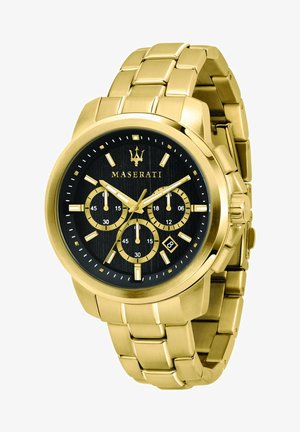 Guldmetal chronograph ur med en sort struktureret urskive, der har tre underviser, datovindue og gyldne accenter på timeindekser og visere.