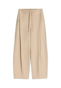 Beige, bő szárú nadrág, gumis derékkal, zsinóros részlettel és oldalsó zsebekkel. Puha anyag, sima textúrával és letisztult dizájnnal.