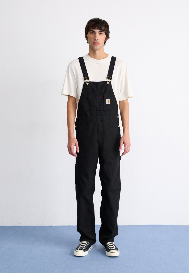 Carhartt WIP - BIB OVERALL - Pantalones cargo - black rinsed, Ampliar