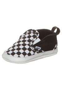 Černobílé kostkované slip-on boty s měkkým textilním svrškem, gumovou podrážkou, elastickými bočními detaily a prošívaným bílým okrajem.