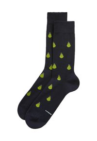 Černé kotníkové ponožky s opakujícím se vzorem malých zelených tváří Grinche.