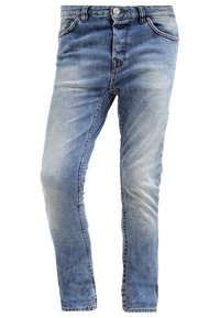 Light blue denim jeans with a slim fit, featuring a faded finish, standard waist, five pockets, and classic stitching.