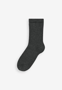 Mørkegrå strømpe lavet af blødt stof. Den har en ribbet kant og en traditionel form med en glat tekstur og standard tådesign.
