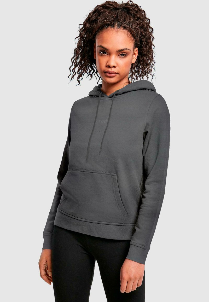 Grå hoodie med en framlapp, långa ärmar, dragsko i huvan och ribbade mudd. Mjuk tyg med en minimalistisk design, lämplig för avslappnad användning.