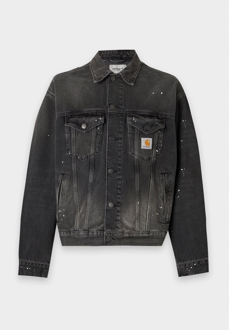 Black denim jacket with button front, two chest flap pockets, side pockets, white paint splatter details, and a small Carhartt logo patch on the chest.
