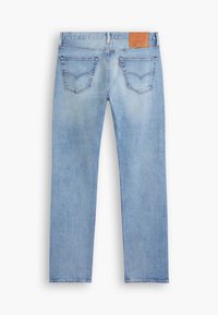 Jean en denim bleu clair vu de dos avec deux poches arrière cousues et un patch en cuir marron sur la ceinture.