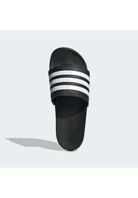 Black slide sandal with a textured sole, featuring three horizontal white stripes across the upper and "adidas" branding on the footbed.