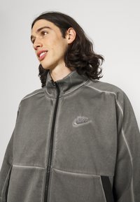 Nike Sportswear WASH REVIVAL - Treniņjaka - black