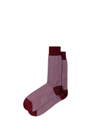 Pair of mid-calf socks with fine red and white pattern, featuring solid dark red cuffs, heels, and toes, laid flat on white background.