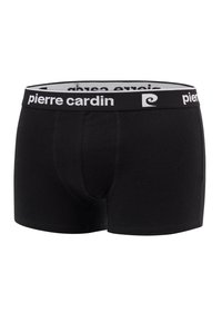 Boxer shorts noirs en tissu doux, avec une ceinture blanche à logo qui porte l'inscription "pierre cardin" dans une police simple et en gras.