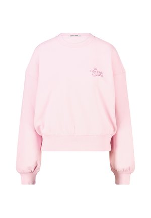 Sweat-shirt rose clair à manches longues avec poignets et ourlet côtelés, col rond, et petit texte et graphique "The Coffee & Book Club" sur la poitrine.