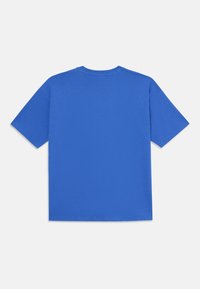 Blå bomulls t-skjorte med rund hals, korte ermer og ensfarget design. Stoffet ser glatt ut med en avslappet passform.