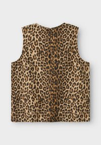 Top sin mangas con estampado de leopardo y cierre de cremallera en la espalda; presenta patrones de color marrón claro, marrón y negro. Tejido suave y texturizado.