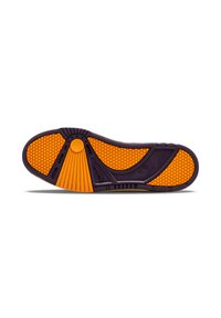 Shoe sole featuring a black and orange color scheme with a honeycomb texture, central circular accent, and distinct traction patterns.