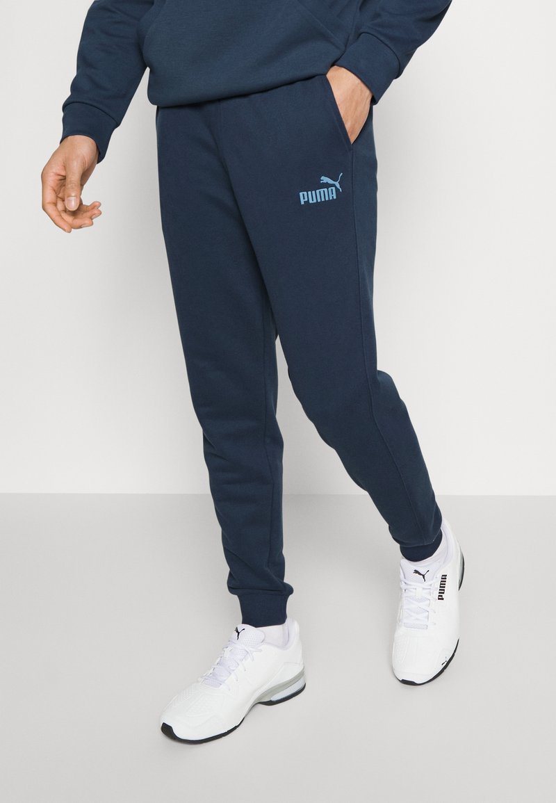 Puma ELEVATED Tracksuit bottoms dark night/dark blue Zalando.co.uk