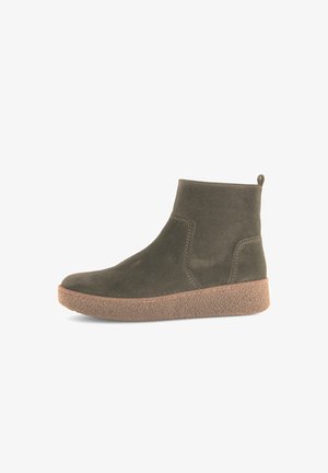 Dark brown suede ankle boot with textured rubber sole and pull tab at the back, side view on white background.