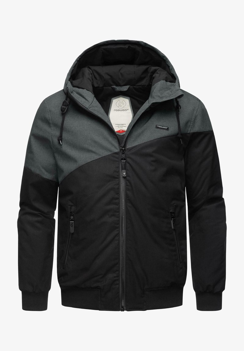 Giacca con cappuccio nera e grigia, con una zip frontale, polsini a costine e due tasche laterali con zip. Realizzata in tessuto testurizzato.