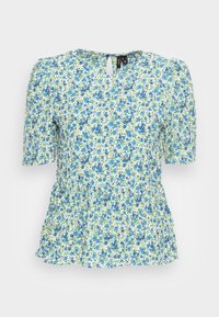 Blusa floral em verde claro com flores azuis e amarelas. Apresenta mangas curtas com volume e um decote em forma de lágrima nas costas. A bainha com volantes adiciona textura.