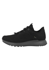 Scarpe da ginnastica nere con tomaia in tessuto testurizzato e suola in gomma a contrasto con battistrada sagomato per una buona aderenza. Design minimalista con lacci.