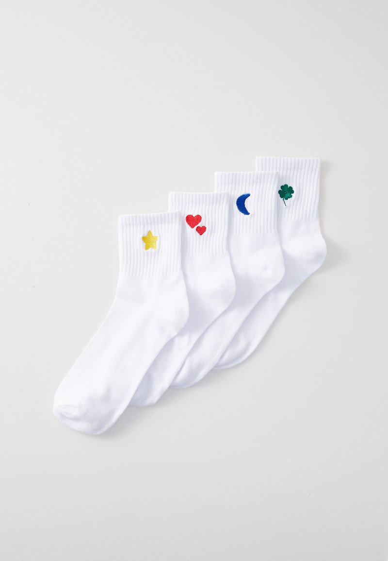 White ankle socks featuring yellow star, red heart, blue crescent moon, and green shamrock embroidered designs on the outer sides.