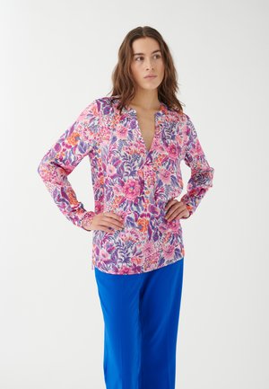 Langärmlige Bluse mit einem lebhaften floralen Muster in Pink, Lila und Orange, einem V-Ausschnitt und leicht lockerer Passform, aus einem glatten Stoff gefertigt.