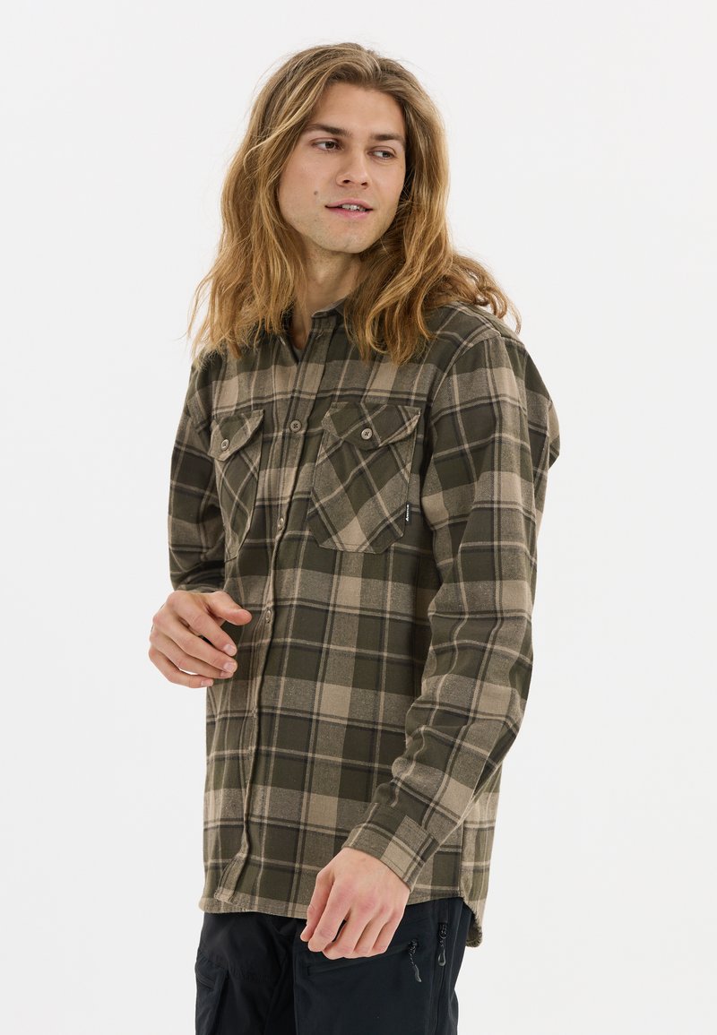 Langemouwen geruite shirt in groen en beige, met twee borstzakken en een knoopsluiting bij de kraag. Zachte stof met een gestructureerde uitstraling.