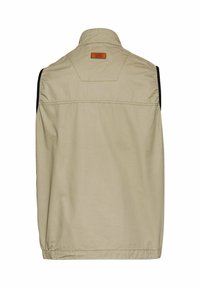Beige ärmellose Weste mit hohem Kragen, schwarzen Seitenakzenten und einem rechteckigen Lederetikett auf der Rückseite. Baumwollmaterial, schlichtes Design.