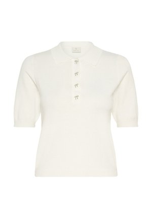 Polo en maille blanche à manches courtes avec quatre petits boutons décoratifs en forme de nœud sur la patte de boutonnage avant.