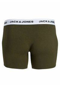 Mörkgröna kalsonger med vit elastisk midjeband som har "JACK & JONES" i svart tryck. Mjukt material, åtsittande design.