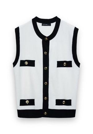 Gilet bianco senza maniche lavorato a maglia con bordi neri, sei bottoni dorati e quattro patte di tasca nere con dettagli a bottoni dorati.