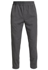 Szare, tkane spodnie o luźnym kroju, z elastycznym pasem i zwężanymi nogawkami. Subtelny wzór w prążki na całej tkaninie.