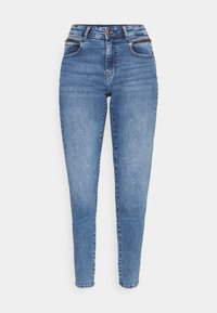 Jeans ajustados de mezclilla en azul claro, con una cintura alta, bolsillos con cremallera y una textura suave con un acabado ligeramente deslavado.