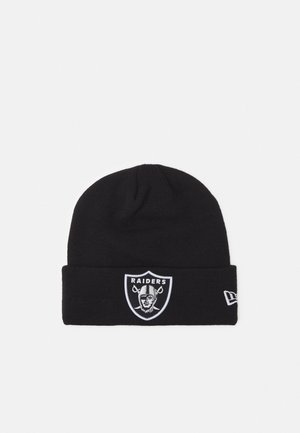 Schwarze Strickmütze mit umgeschlagenem Saum, besticktem Raiders-Logo in Weiß und Grau sowie einem kleinen seitlichen Etikett. Weiche Textur.