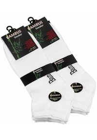 Weiße Sneakersocken aus Bambus, mit einer weichen Textur, elastischen Bündchen und schwarzer Verpackung mit Produktdetails.
