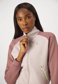 Nike Performance HERITAGE JACKET - Træningsjakke - platinum violet/smokey mauve/barely volt