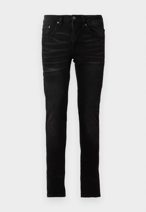 Jeans negros ajustados con una textura de denim suave, diseño tradicional de cinco bolsillos, cierre con cremallera y detalles de desvanecimiento sutil en la tela.